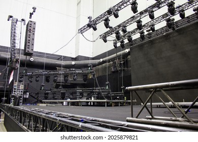 Installation of professional sound, light, video and stage equipment for a show. Technical preparing for the concert. - Shutterstock ID 2025879821