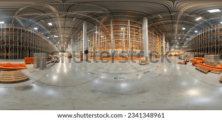 Installation of shelves and racks inside logistics distribution warehouse, 360 degree panorama. Full equirectangular projection for virtual reality or VR.