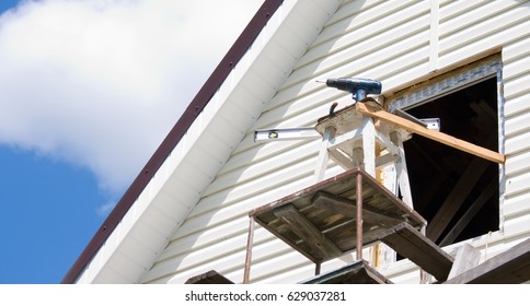 Installation Of A Siding On A House Against The Sky