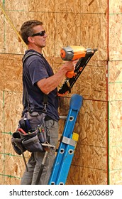 Installation Of Sub Siding On A New Commercial Residential Apartment Housing Project By Framing Contractor