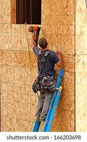 Installation Of Sub Siding On A New Commercial Residential Apartment Housing Project By Framing Contractor