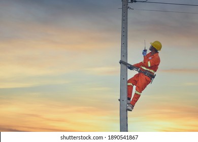 Installation Of Switching And Connecting Overhead Electrical Lines On A Pole. An Electrician Is Working On A Pole.Linemen.