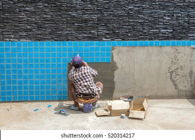 Installation of tiles in swimming pool construction.Construction Pool.