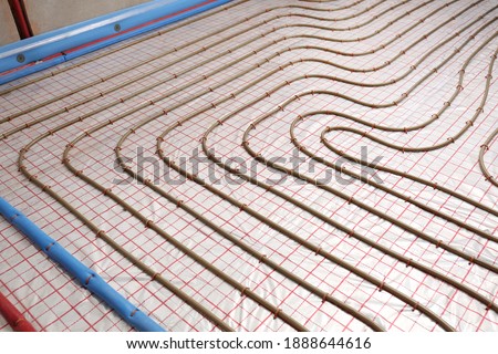 Installation of underfloor heating system in building