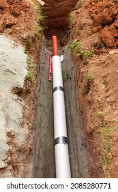 Installation Of Water Main, Sanitary Sewer, Storm Drain Systems, Plastic Pipes Wrapped In Insulation