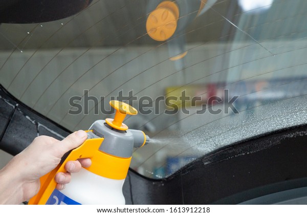 Installation of window film on car Windows.\
Protection from UV\
light.