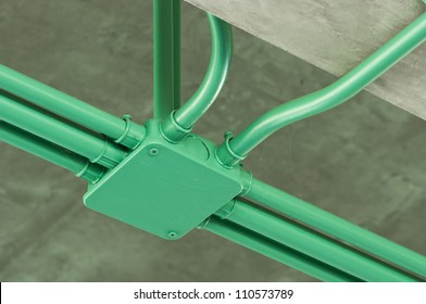 Installed Conduit painted with green color