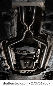 Installed custom exhaust system in performance car after TIG welding and automotive tuning.