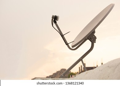 Installed Satellite Dish Or DTH Or Direct To Home Tv On The Roof.