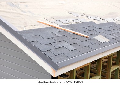 Installing Bitumen Roof Shingles Foto Stok 526719853 | Shutterstock