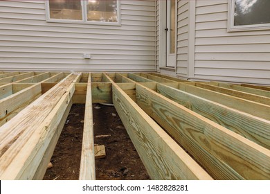 Installing deck patio construction. boards with above ground deck