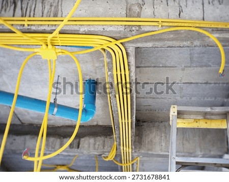 Installing Electrical and Plumbing Conduits Inside a Building During Construction