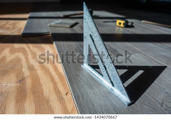 Installing Engineered Laminated Wood Flooring Tools Stock Photo