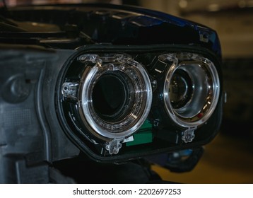 Installing The Headlight On The Car. Repair Of Car Headlights. Tuning And Restoration Of Automotive Optics. Installation Of The Bi LED Lens In The Headlight Housing.