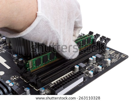 Installing memory module in DIMM slot on modern PC computer motherboard