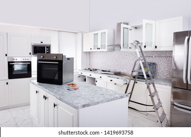 Installing New Micro Oven And Induction Hob In Modern Kitchen