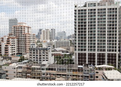 Installing Polypropylene Mesh Bird Netting At Apartment Or Condominium In Bangkok City, Thailand Is To Protect Birds From Nesting Anf Anti Uv.