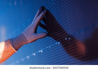 Installing PV photovoltaic  solar panels on the roof. No people are visible, close up image in daylight. - Powered by Shutterstock