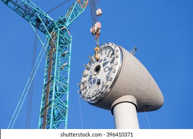 Installing rotor house at the top of a big new Dutch wind turbine