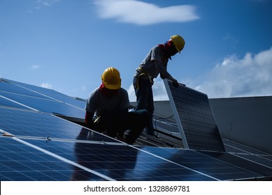Installing a Solar Cell on a Roof, Shadow image - Shutterstock ID 1328869781