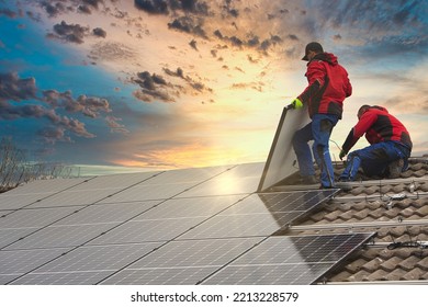Installing solar photovoltaic panel system. Solar panel technician installing solar panels on roof. Alternative energy ecological concept.
 - Shutterstock ID 2213228579