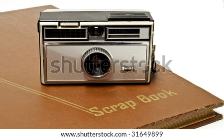 Instamatic camera on a scrapbook