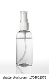 Instant antiseptic hand sanitizer mist spray, antibacterial alcohol liquid. One transparent plastic bottle with atomizer pump isolated on white background, studio shot. Mini travel pocket small size.