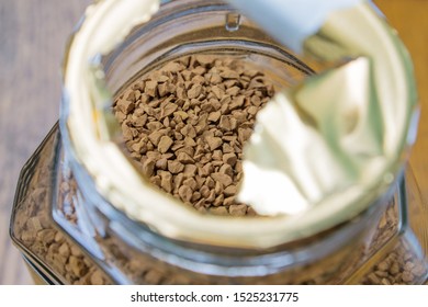 Instant Coffee Granules In A Glass Pot.   Selective Focus, Close-up.