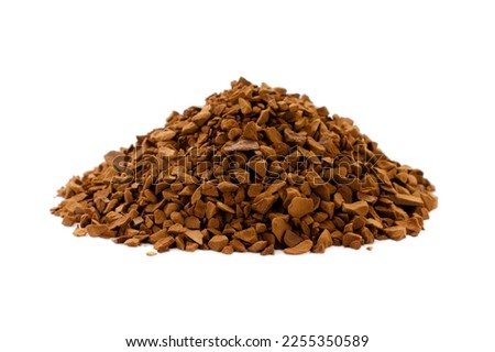 Instant coffee, granules isolated on white background. Heap of instant coffee isolated on white background. Granular, instant coffee isolated on white background. Heap of granulated coffee.
