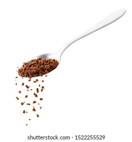 Instant Coffee Spills From A Spoon On A White. Isolated