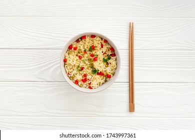 Instant Noodle With Pepper,peas And Greens. White Wooden Background Top View Copy Space