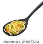 Instant noodle soup in black spoon isolated on white background