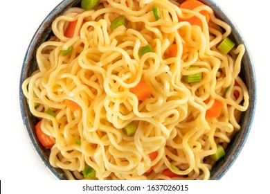 Instant Noodles With Carrot And Scallions, Overhead Close-up Shot On A White Background