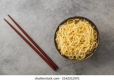 Instant Noodles. Cooked Chinese Noodles In A Bowl. Top View.