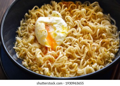 Instant noodles with egg on a bowl. - Shutterstock ID 1930963655