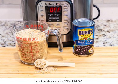 Instant Pot dinner preparation with brown rice and black beans