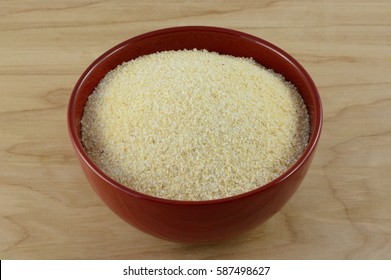 Instant Raw Hominy Grits In Red Bowl