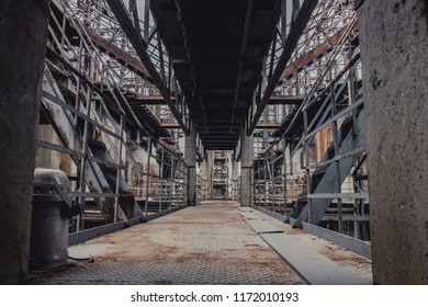 Institutional steel bridge corridor for unoccupied factories - Shutterstock ID 1172010193
