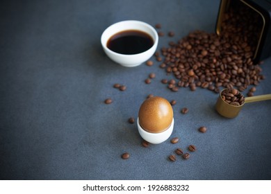 Instructions how to color easter eggs with natural dye. Brown color from coffee. Copy space. Grey background