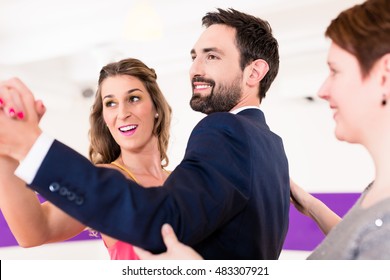 Instructor In Dance School With Couple Of Man And Woman