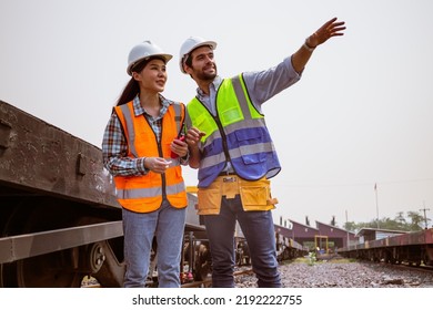 Instructor with young people in engineering training. Engineer consult discussion with team work for construction site,project,railway,train. Two Diversity people engineers are talking about work. - Powered by Shutterstock