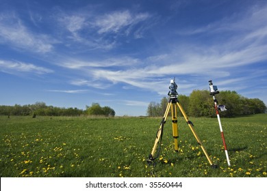 Instrument In The Field - Spring Land Surveying.