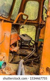 Instrument Panel And Air Conditioning Unit Inside Cab Of Old, Rusted, Broken Down Bulldozer.