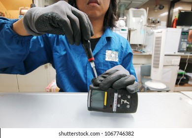 Instrument Technician Is Repairing Or Function Check Of Personal Gas Tester Or Gas Detector For The Job Calibration Of Gas.