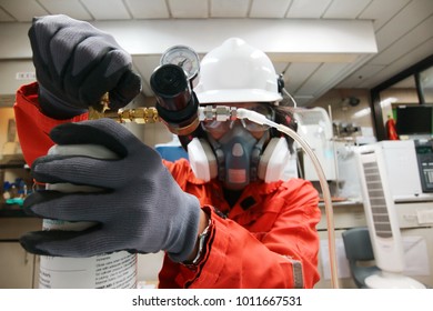 Instrument Technician Is Take Standard Gas For The Job Calibrate Or Function Check Of Personal Gas Tester Or Gas Detector.