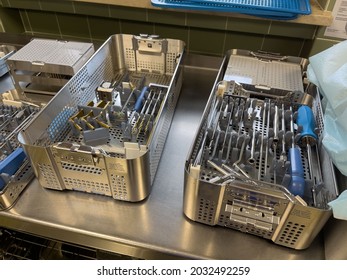 An Instrument Tray Contains Surgical Instruments For Implanting A Titanium Plate For A Femur Fracture