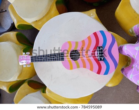 Instrument,Instrument sound,fresh air while playing with the instrument,hot summer,playing guitar in summer time,happy,smooth,sound