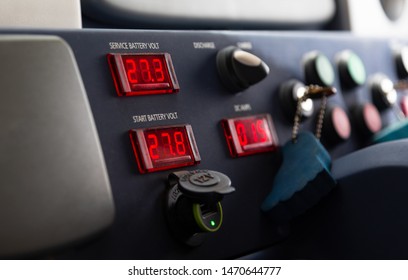 Instruments and gauges on dashboard used by a boat captain when steering the vessel from the lower deck on motor yacht