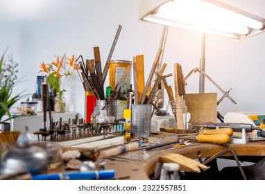 Instruments kit in a large workshop for the manufacture of handmade jewelry - Powered by Shutterstock