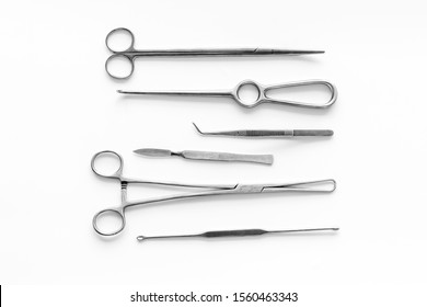 Instruments For Plastic Surgery On White Background Top View Flat Lay Pattern